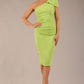 A Brunette Model is wearing a diva catwalk Phoebe One Shoulder Pencil Dress in knee length side vent - Lime green front