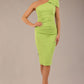 A Brunette Model is wearing a diva catwalk Phoebe One Shoulder Pencil Dress in knee length side vent - Lime green front