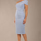 A Brunette Model is wearing a diva catwalk Phoebe One Shoulder Pencil Dress in knee length side vent - powder blue front 