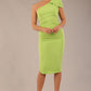 A Brunette Model is wearing a diva catwalk Phoebe One Shoulder Pencil Dress in knee length side vent - Lime green front