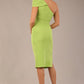 A Brunette Model is wearing a diva catwalk Phoebe One Shoulder Pencil Dress in knee length side vent - Lime green back
