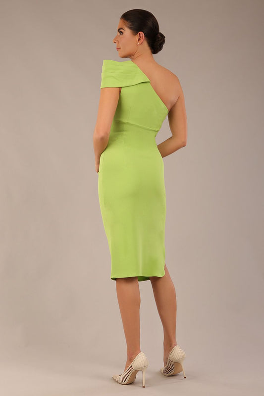 A Brunette Model is wearing a diva catwalk Phoebe One Shoulder Pencil Dress in knee length side vent - Lime green back
