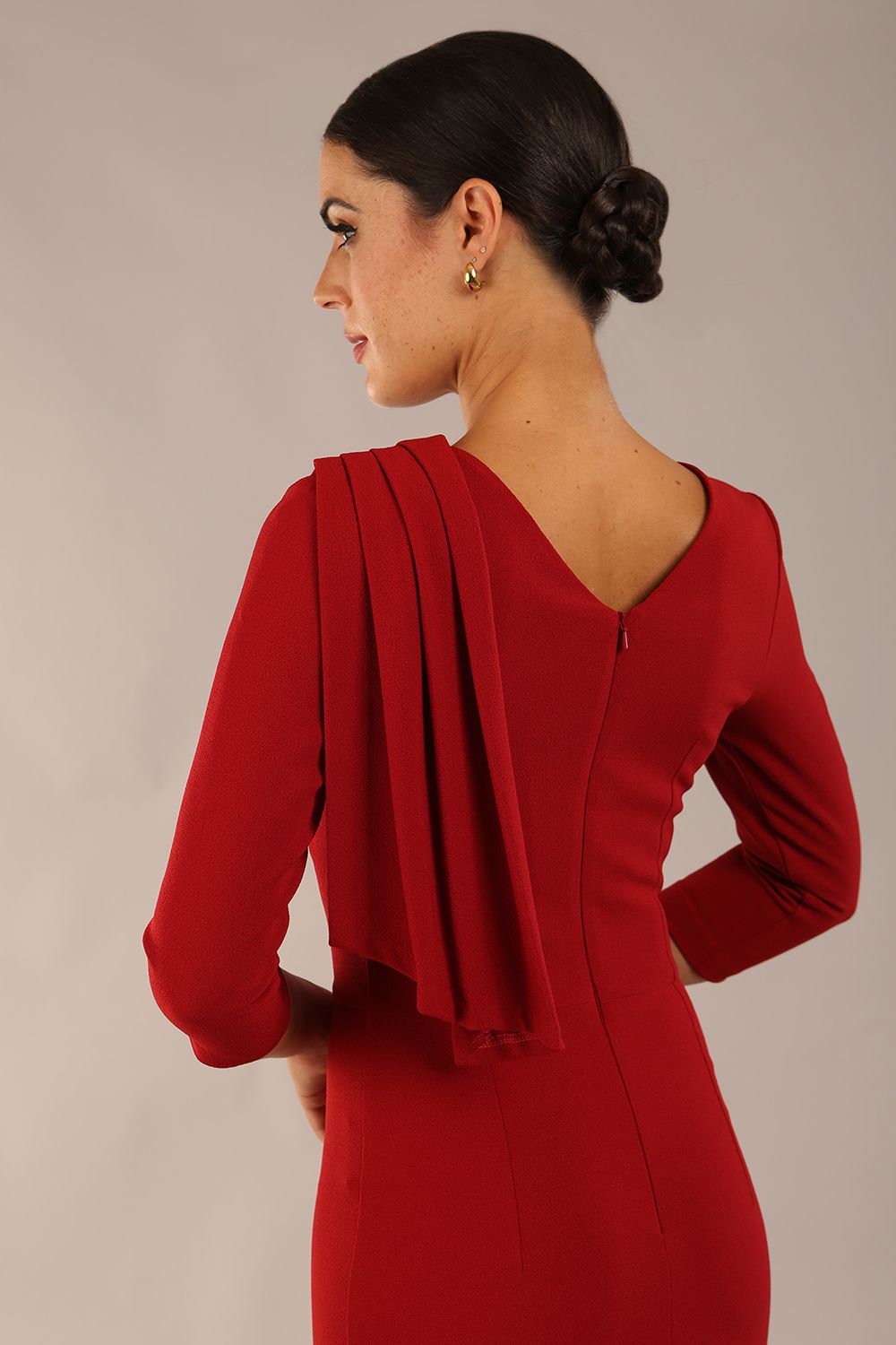 model wearing a diva catwalk Frieth Gathered Shoulder Dress 3/4 sleeves knee length with shoulder detail in rosewood red colour back