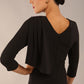 model wearing a diva catwalk Frieth Gathered Shoulder Dress 3/4 sleeves knee length with shoulder detail in black colour