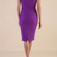 Model is wearing Brooke Cap Sleeve Pencil Dress in Couture Stretch Fabric with V Neckline and Hip Pleating in Amethyst Purple back