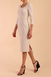 Model wearing diva catwalk Aurelia 3/4 Sleeve Knee Lenght Pencil Dress in Sandy Cream side