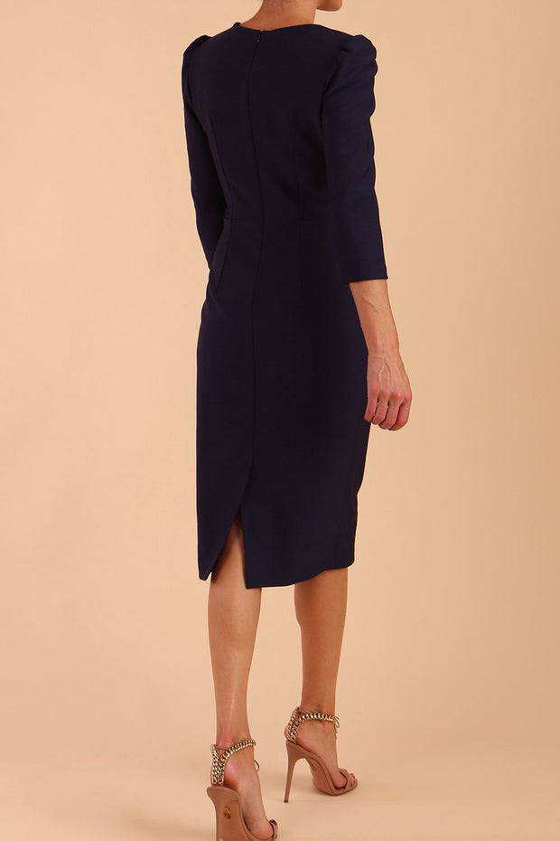 Model wearing diva catwalk Aurelia 3/4 Sleeve Knee Lenght Pencil Dress in Navy Blue back