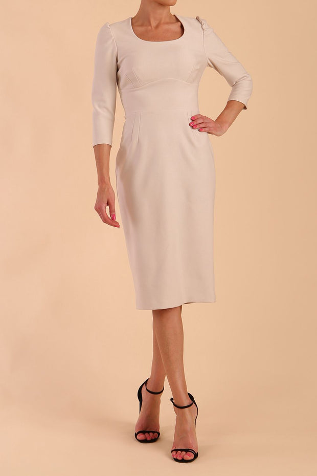 Model wearing diva catwalk Aurelia 3/4 Sleeve Knee Lenght Pencil Dress in Sandy Cream front
