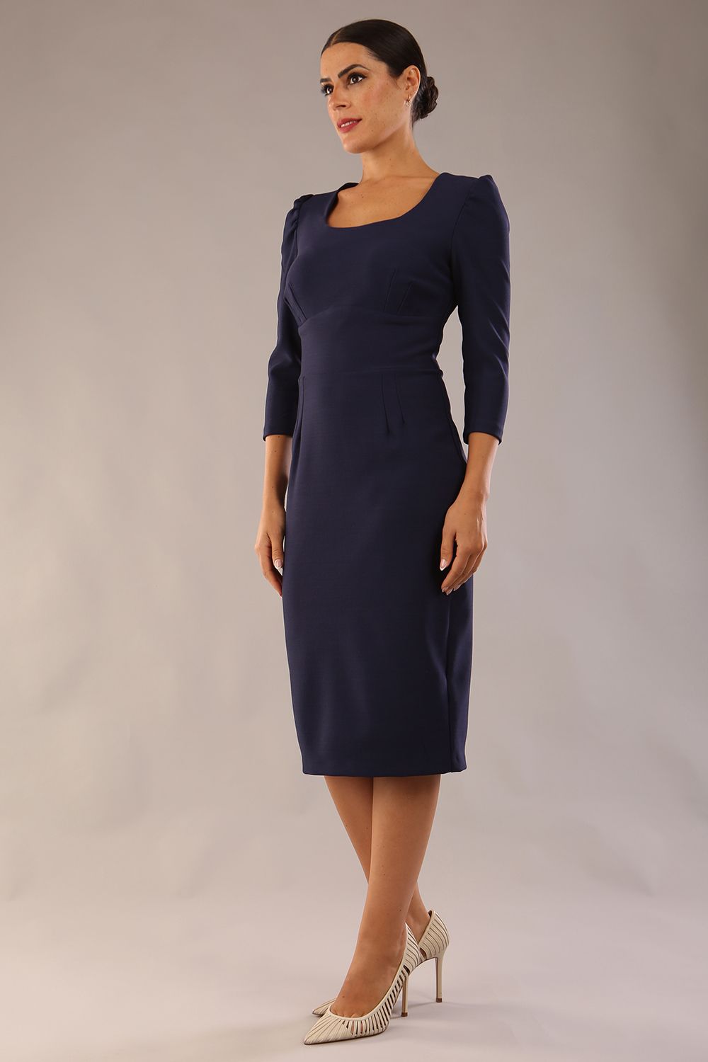 Model wearing diva catwalk Aurelia 3/4 Sleeve Knee Lenght Pencil Dress in Navy Blue front