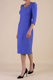 Model wearing diva catwalk Aurelia 3/4 Sleeve Knee Lenght Pencil Dress in Thistle Blue side