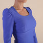 Model wearing diva catwalk Aurelia 3/4 Sleeve Knee Lenght Pencil Dress in Thistle Blue detail on the bust