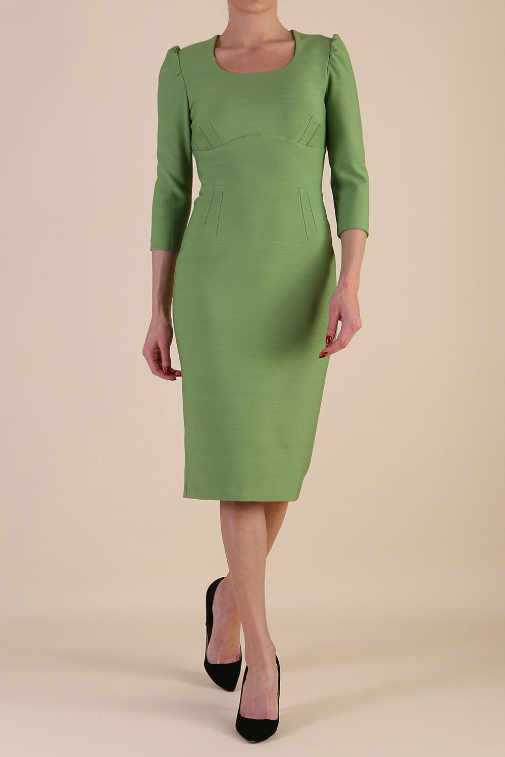 Model wearing diva catwalk Aurelia 3/4 Sleeve Knee Lenght Pencil Dress in Citus Green front