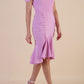 Model wearing diva catwalk Seraphina Fishtail skirt dress in Dawn Pink side