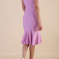 Model wearing diva catwalk Seraphina Fishtail skirt dress in Dawn Pink back