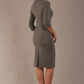 The model is wearing a diva catwalk Juliette 3/4 Sleeve Knee Length dress with bow detail in castlerock grey colour against a plain background back view