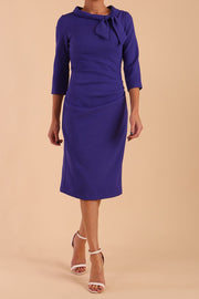 Model wearing diva catwalk Juliette 3/4 Sleeve Knee Length dress in Indigo Blue front