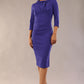 Model is wearing a diva catwalk Juliette 3/4 Sleeve Knee Length dress with bow detail in Indigo Blue front