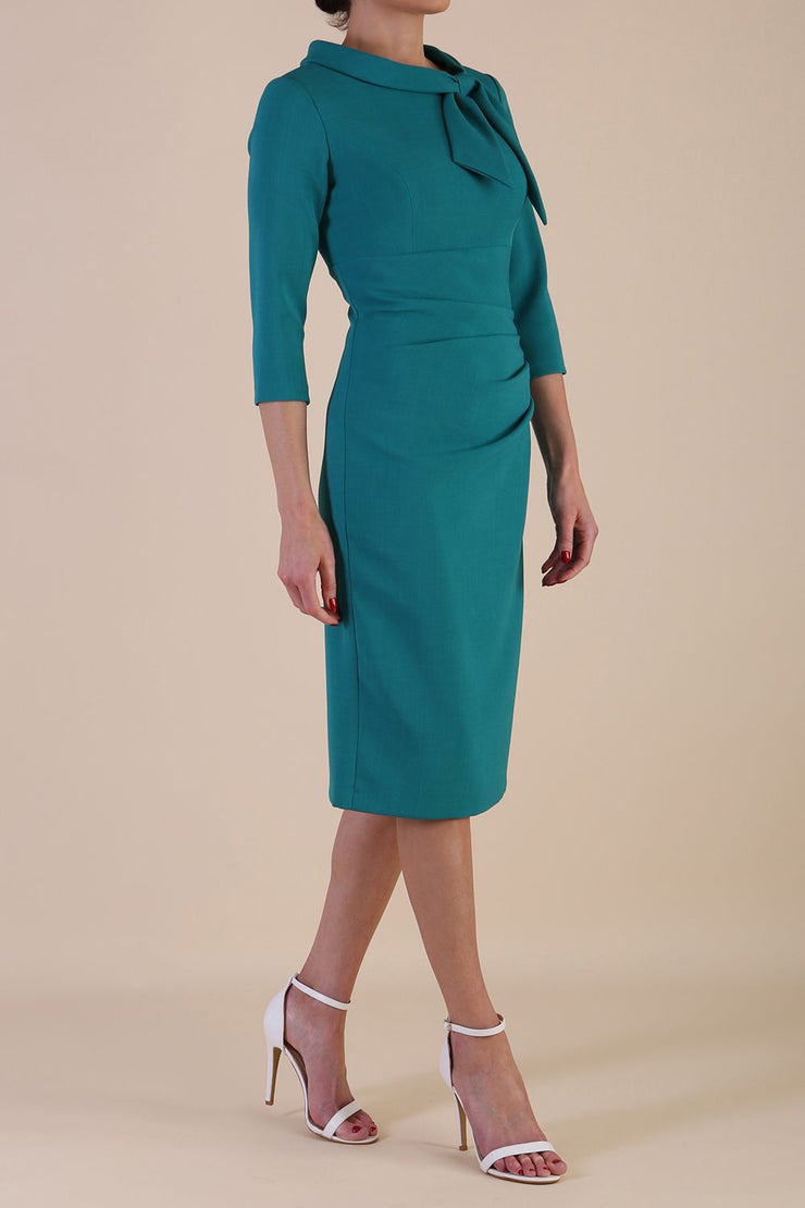 Model wearing diva catwalk Juliette 3/4 Sleeve Knee Length Pencil dress in Parasailing Green side