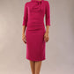 Model is wearing a diva catwalk Juliette 3/4 Sleeve Knee Length dress with bow detail in magenta front