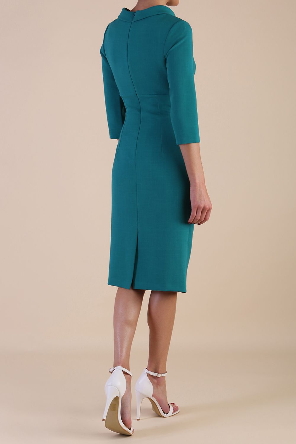 Model wearing diva catwalk Juliette 3/4 Sleeve Knee Length dress in Parasailing Green back