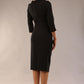 Model is wearing a diva catwalk Juliette 3/4 Sleeve Knee Length dress with bow detail  in Black back