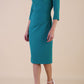 Model wearing diva catwalk Juliette 3/4 Sleeve Knee Length dress in Parasailing Green side