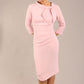 Model is wearing a diva catwalk Juliette 3/4 Sleeve Knee Length dress with bow detail in crystal pink colour