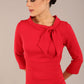 Model is wearing a diva catwalk Juliette 3/4 Sleeve Knee Length dress with bow detail in scarlet red colour