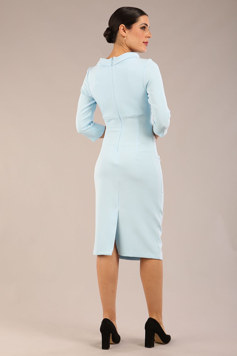 Model is wearing a diva catwalk Juliette 3/4 Sleeve Knee Length dress with bow detail in sky blue colour
