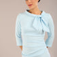 Model is wearing a diva catwalk Juliette 3/4 Sleeve Knee Length dress with bow detail in sky blue colour
