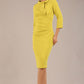 Model is wearing a diva catwalk Juliette 3/4 Sleeve Knee Length dress with bow detail in citrus green colour