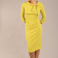 Model is wearing a diva catwalk Juliette 3/4 Sleeve Knee Length dress with bow detail in citrus green colour