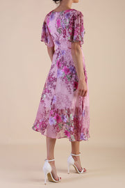 Model wearing diva catwalk Petra Floral Print A-Line skirt dress back