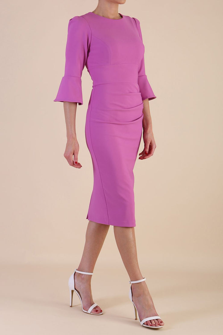 Model wearing diva catwalk Santorini 3/4 Length Bell Sleeve Midi Pencil Dress in Begonia Pink side