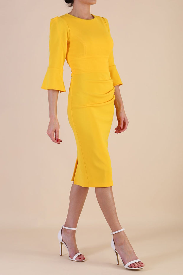 Model wearing diva catwalk Santorini 3/4 Length Bell Sleeve Midi Pencil Dress in Saffron Yellow side