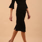 Model wearing diva catwalk Santorini 3/4 Length Bell Sleeve Midi Pencil Dress in Black front side