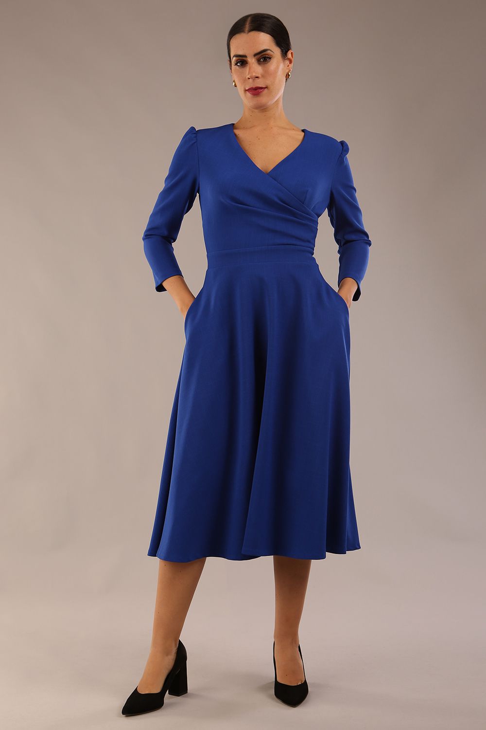 Model wearing diva catwalk Kate 3/4 Length Sleeve A-Line Swing Dress with pockets in Cobalt Blue colour