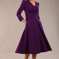 Model wearing diva catwalk Kate 3/4 Length Sleeve A-Line Swing Dress with pockets in Deep Purple front