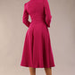 Model wearing diva catwalk Kate 3/4 Length Sleeve A-Line Swing Dress in Magenta Haze with pockets back