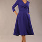 Model wearing diva catwalk Kate 3/4 Length Sleeve A-Line Swing Dress in Spectrum Indigo with pockets  side