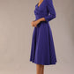 Model wearing diva catwalk Kate 3/4 Length Sleeve A-Line Swing Dress in Spectrum Indigo with pockets  side