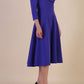 Model wearing diva catwalk Kate 3/4 Length Sleeve A-Line Swing Dress in Spectrum Indigo with pockets side