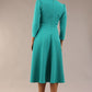 Model wearing diva catwalk Kate 3/4 Length Sleeve A-Line Swing Dress with side pockets in Aqua Green colour