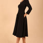 Model wearing diva catwalk Kate 3/4 Length Sleeve A-Line Swing Dress in Black front  side
