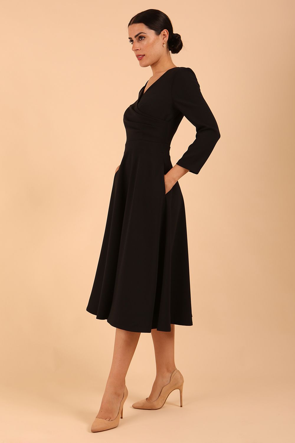 Model wearing diva catwalk Kate 3/4 Length Sleeve A-Line Swing Dress in Black front  side