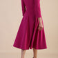 Model wearing diva catwalk Kate 3/4 Length Sleeve A-Line Swing Dress in Magenta Haze with pockets back