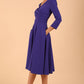 Model wearing diva catwalk Kate 3/4 Length Sleeve A-Line Swing Dress in Spectrum Indigo with pockets  side