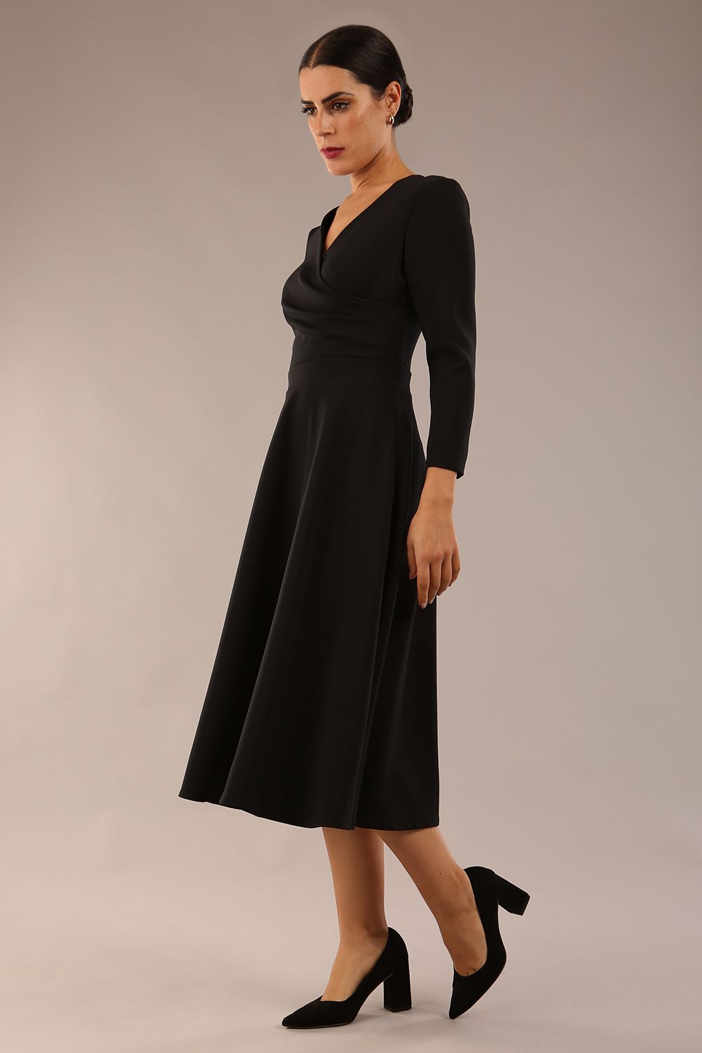 Model wearing diva catwalk Kate 3/4 Length Sleeve A-Line Swing Dress with pockets in Black front