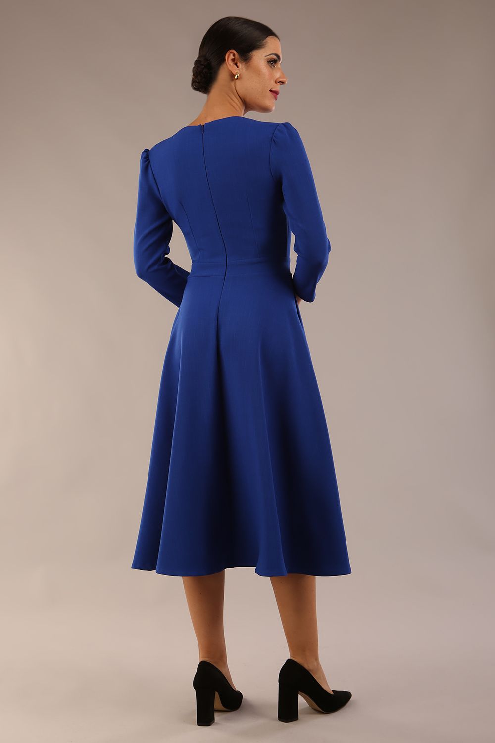 Model wearing diva catwalk Kate 3/4 Length Sleeve A-Line Swing Dress with pockets in Cobalt Blue colour