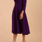 Model wearing diva catwalk Kate 3/4 Length Sleeve A-Line Swing Dress in Deep Purple front side
